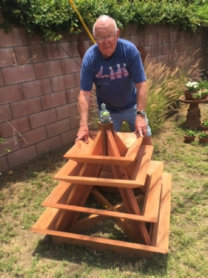 Customer photo with redwood planter