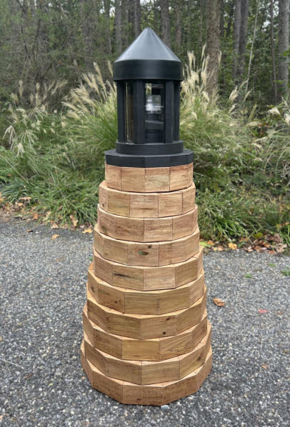 4 1/2 ft. tall lawn lighthouse made out of treated lumber