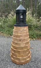 4 1/2 ft. tall lawn lighthouse made out of treated lumber